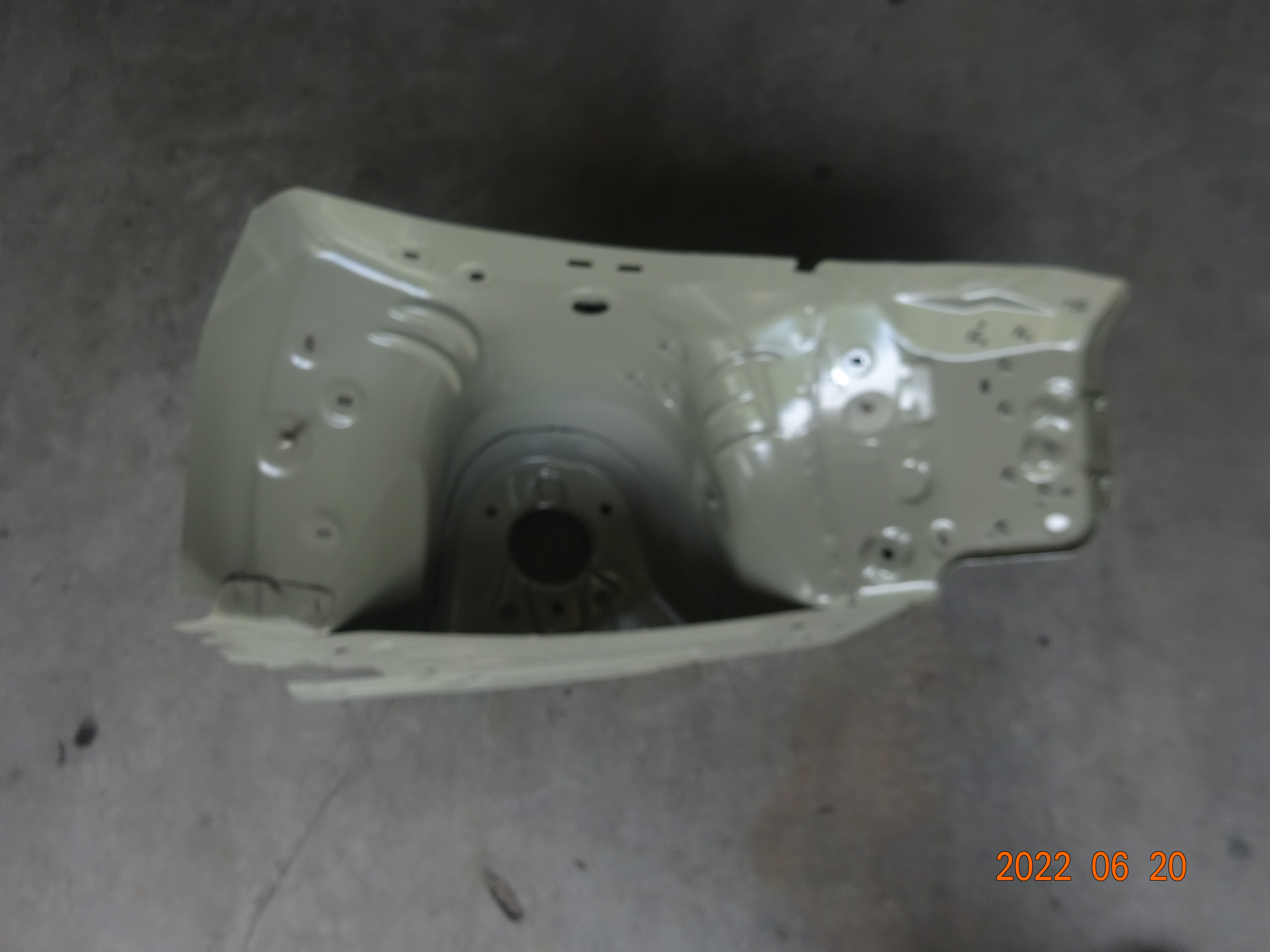 Left front wheel housing assembly