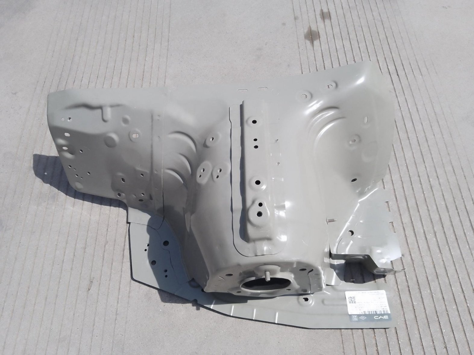 Left front wheel housing assembly
