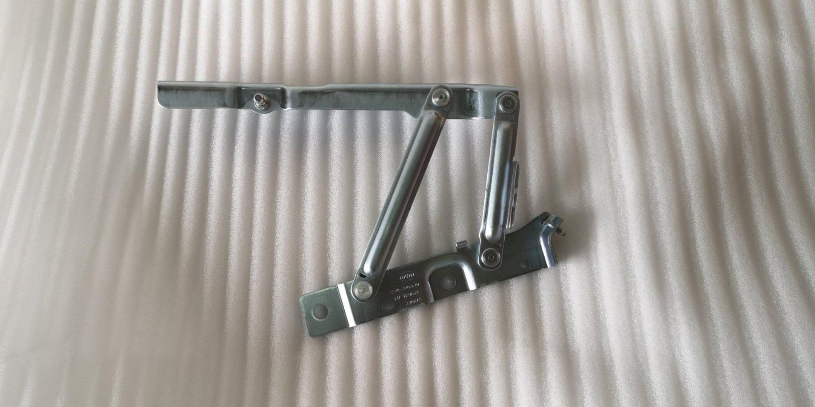Front Hood Left Hinge Assembly