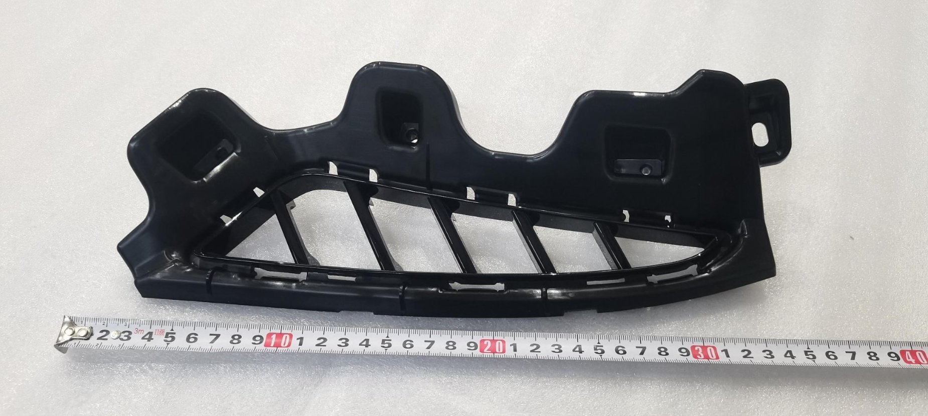 Front bumper right trim