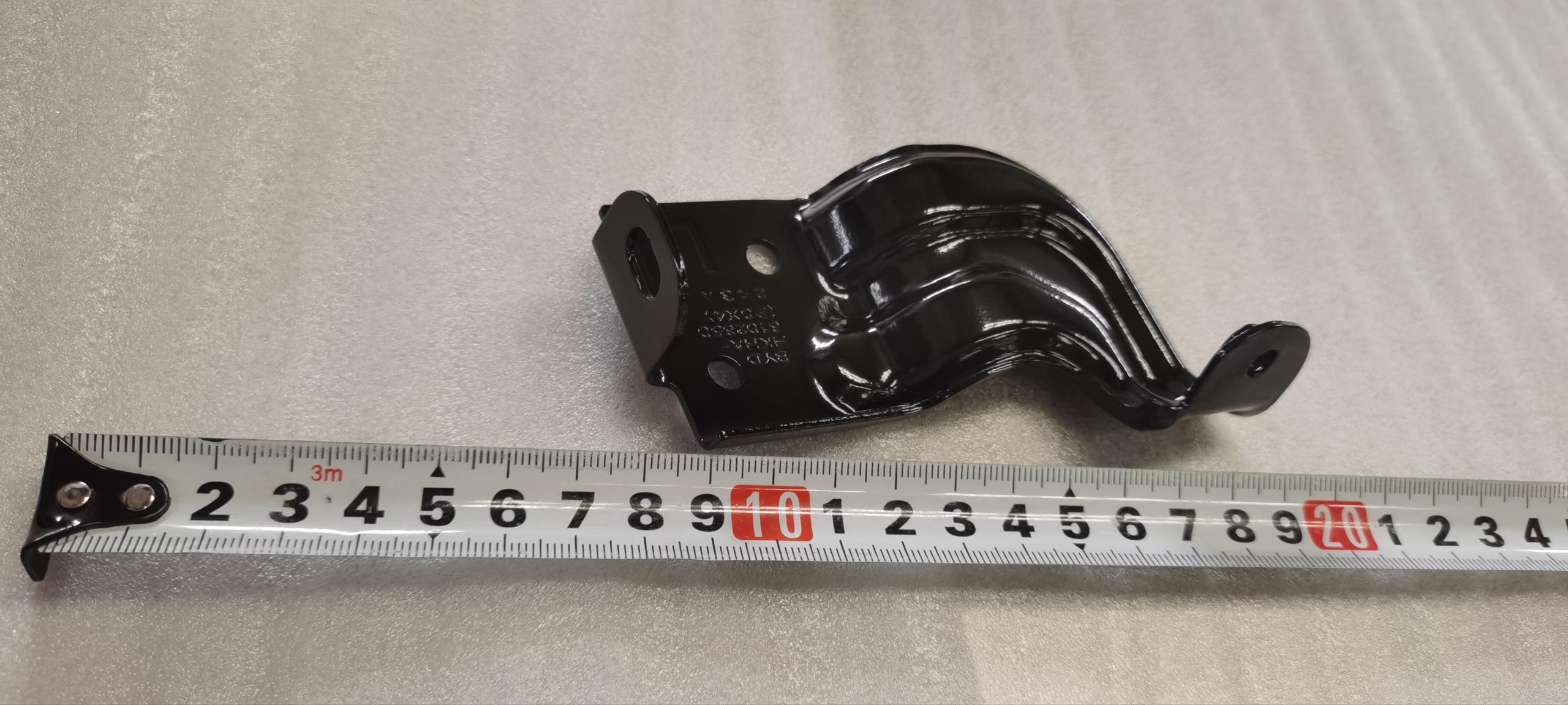 Left front door grab handle bracket assembly