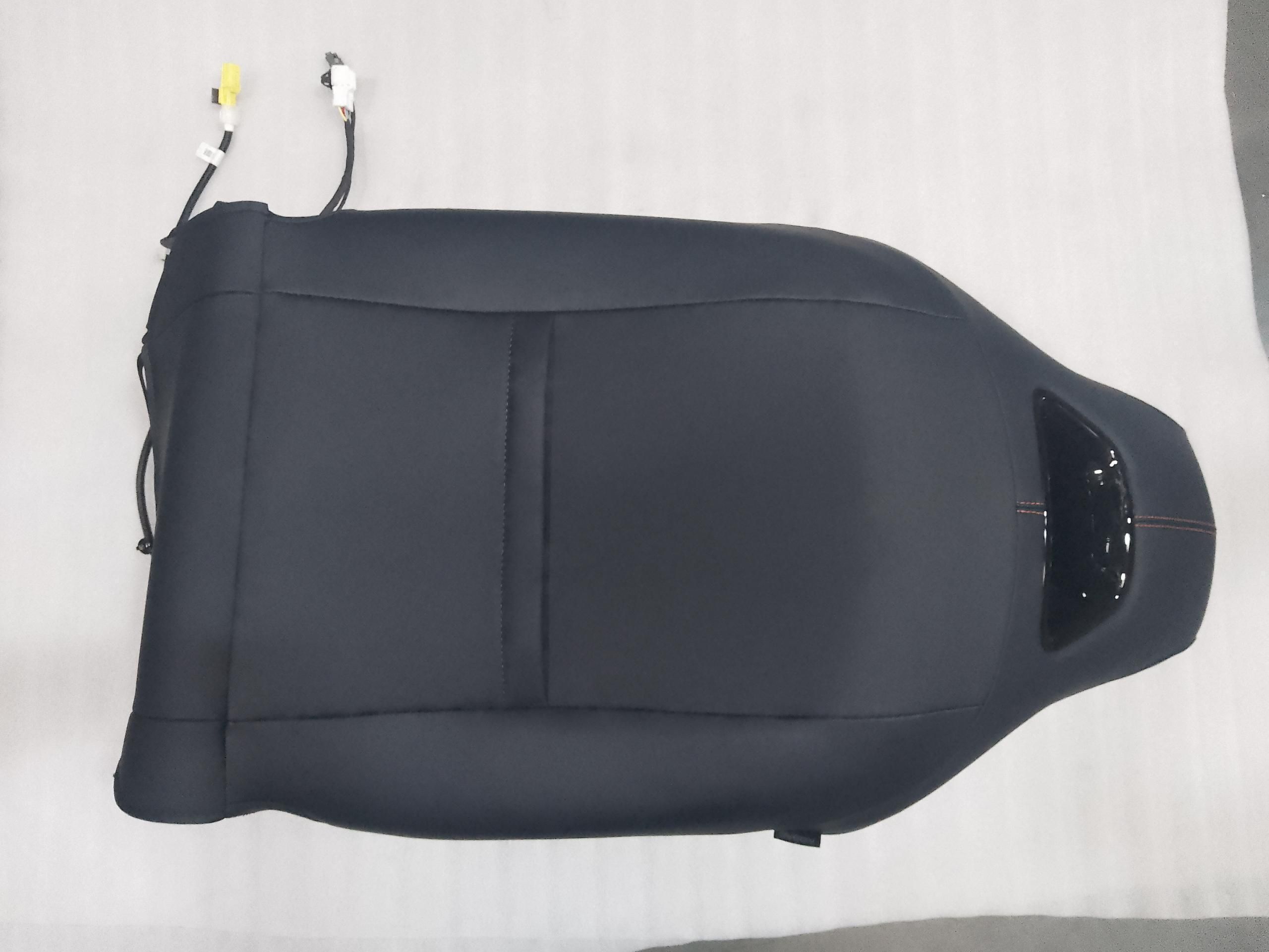 Front passenger seatback assembly