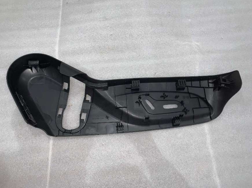 Driver seat left side trim panel