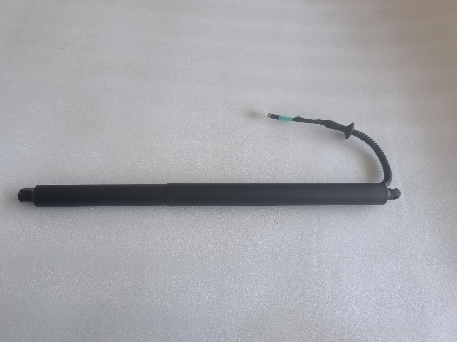 Tailgate left power spring body