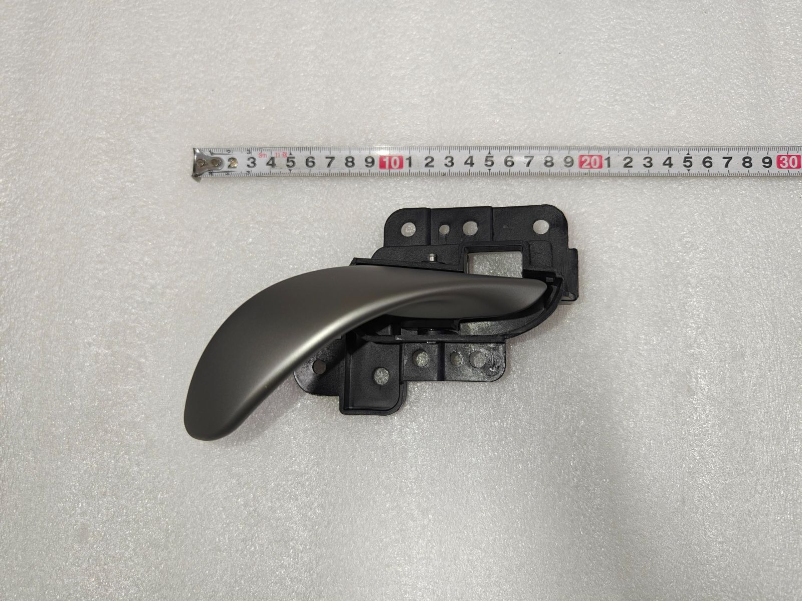 Left front door inner grab handle assembly