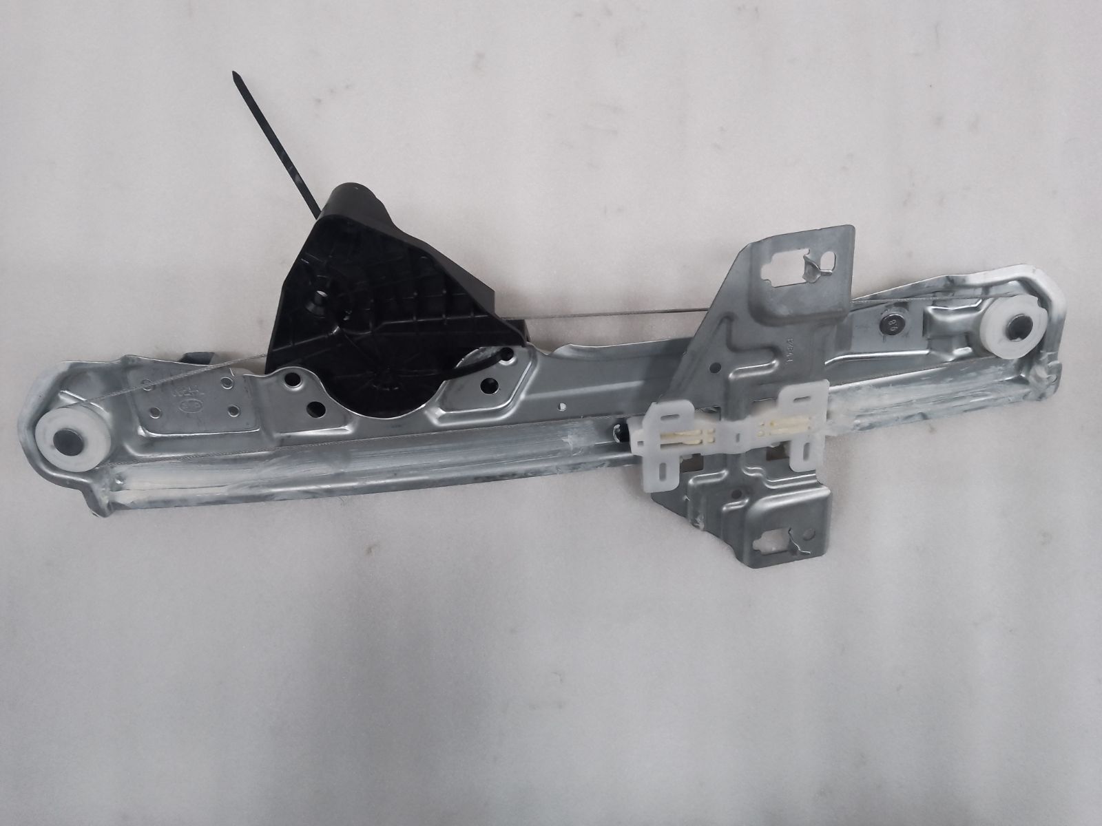 Left rear door window regulator bracket assembly