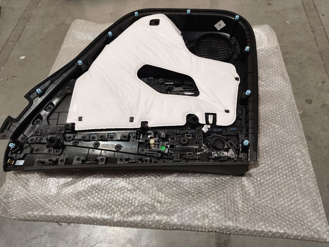 Left rear door trim panel sub-assembly – Sea Salt Grey
