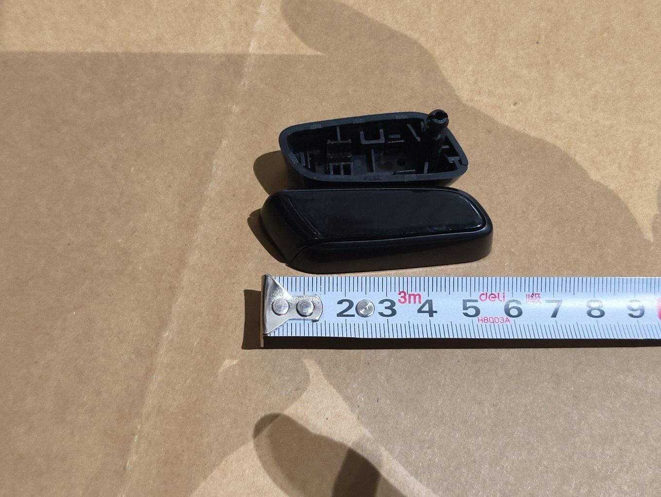 Front passenger seat cushion adjustment button
